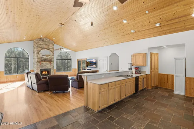 a bedroom with a bed and a fireplace