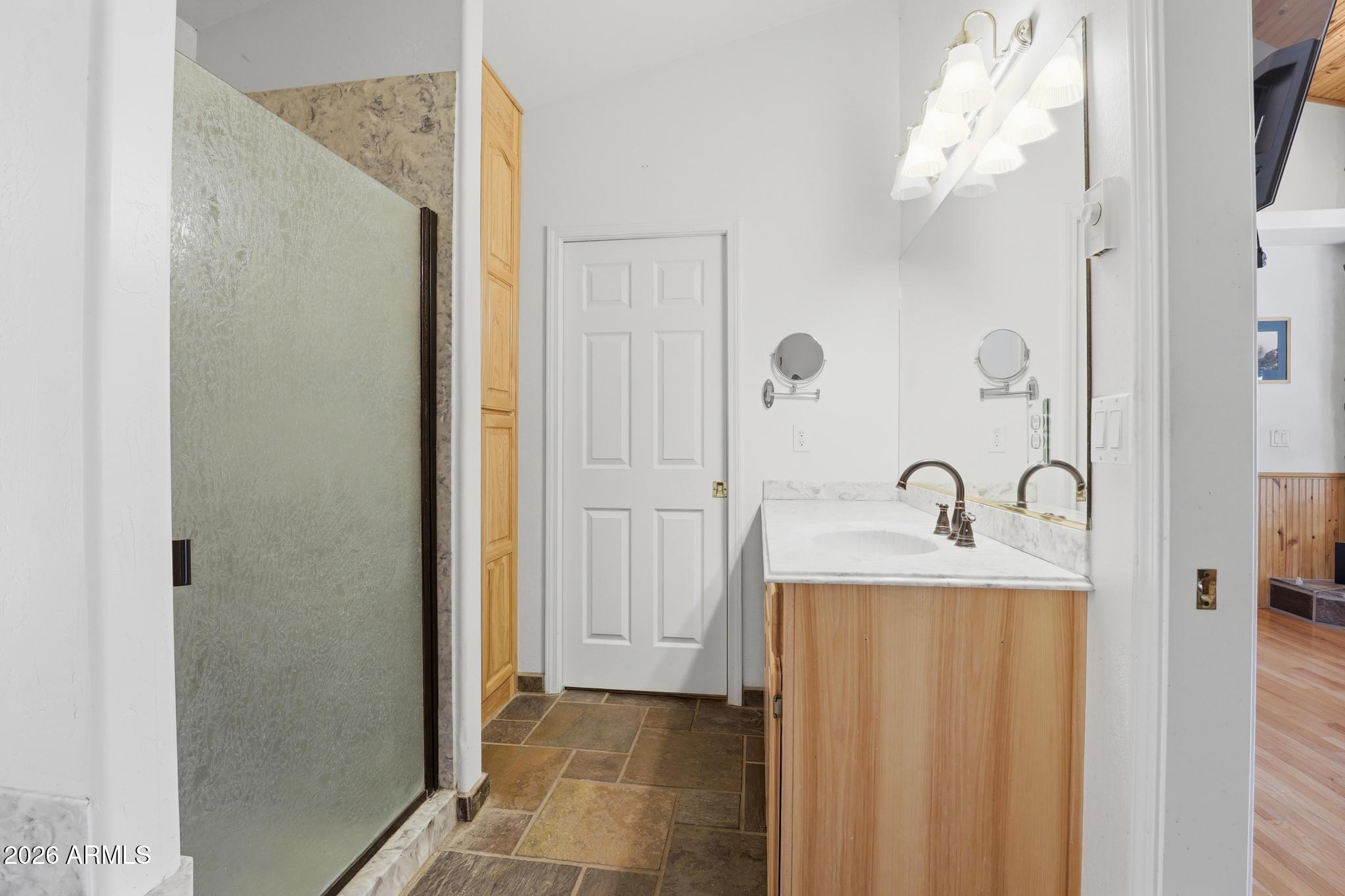 178 Memory Lane Payson, AZ 85541 - Photo 31 of 58 a bathroom with a sink vanity and shower