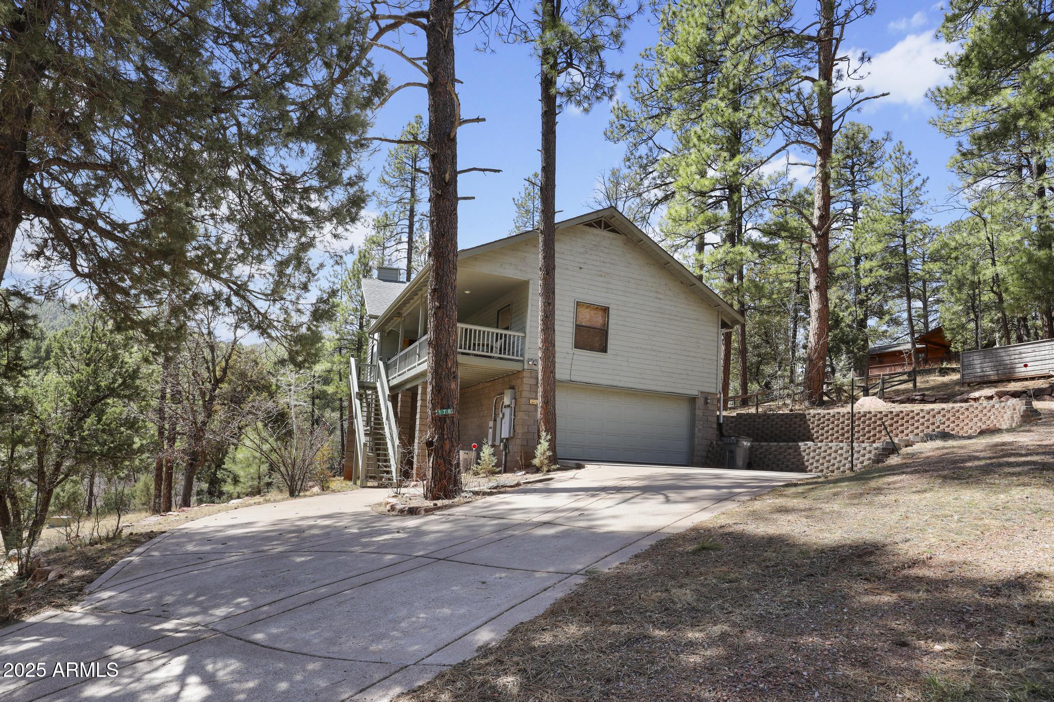 178 Memory Lane Payson, AZ 85541 - Photo 46 of 58 a view of a house with a yard