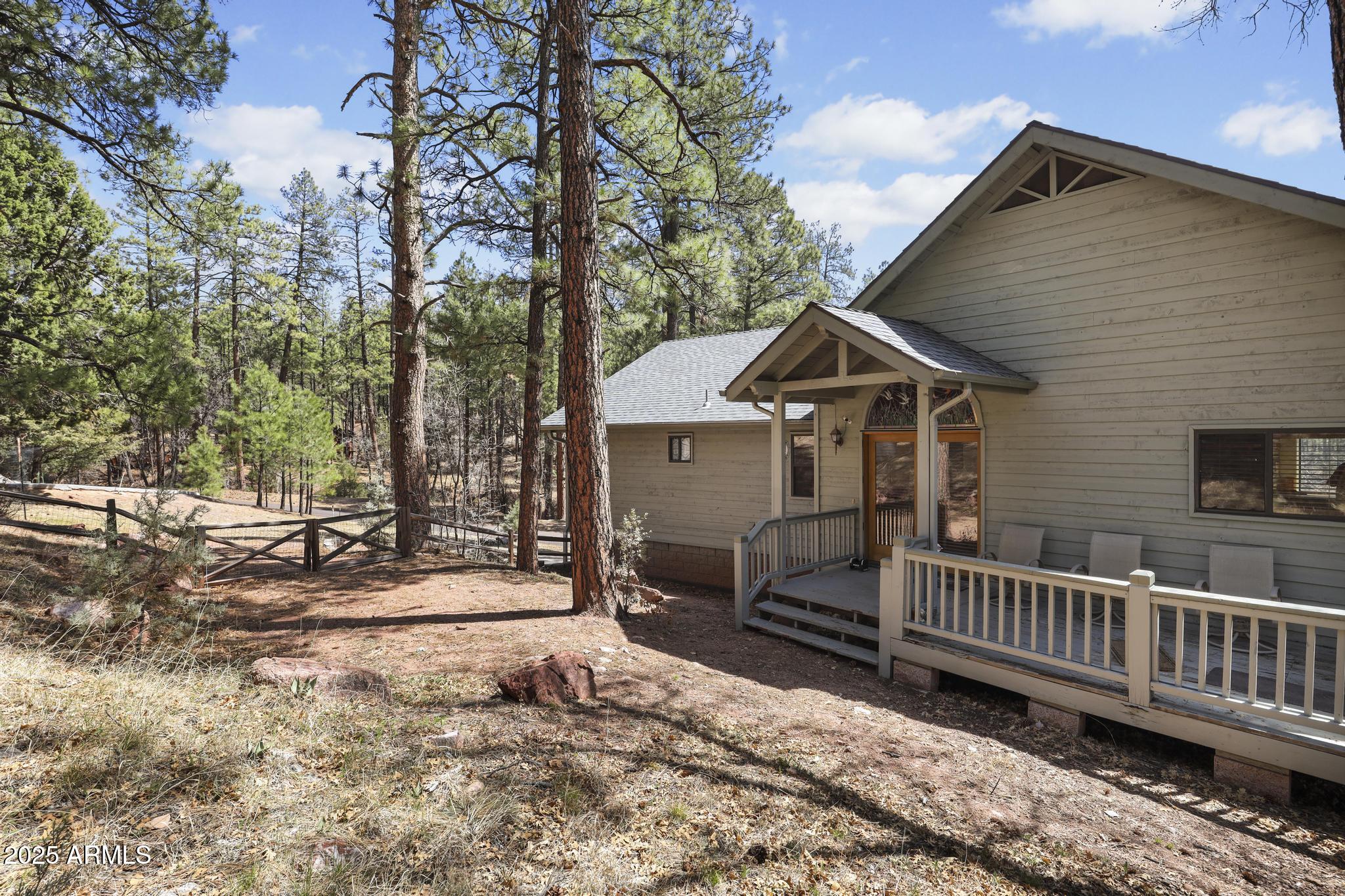 178 Memory Lane Payson, AZ 85541 - Photo 47 of 58 a view of a house with a yard and wooden fence