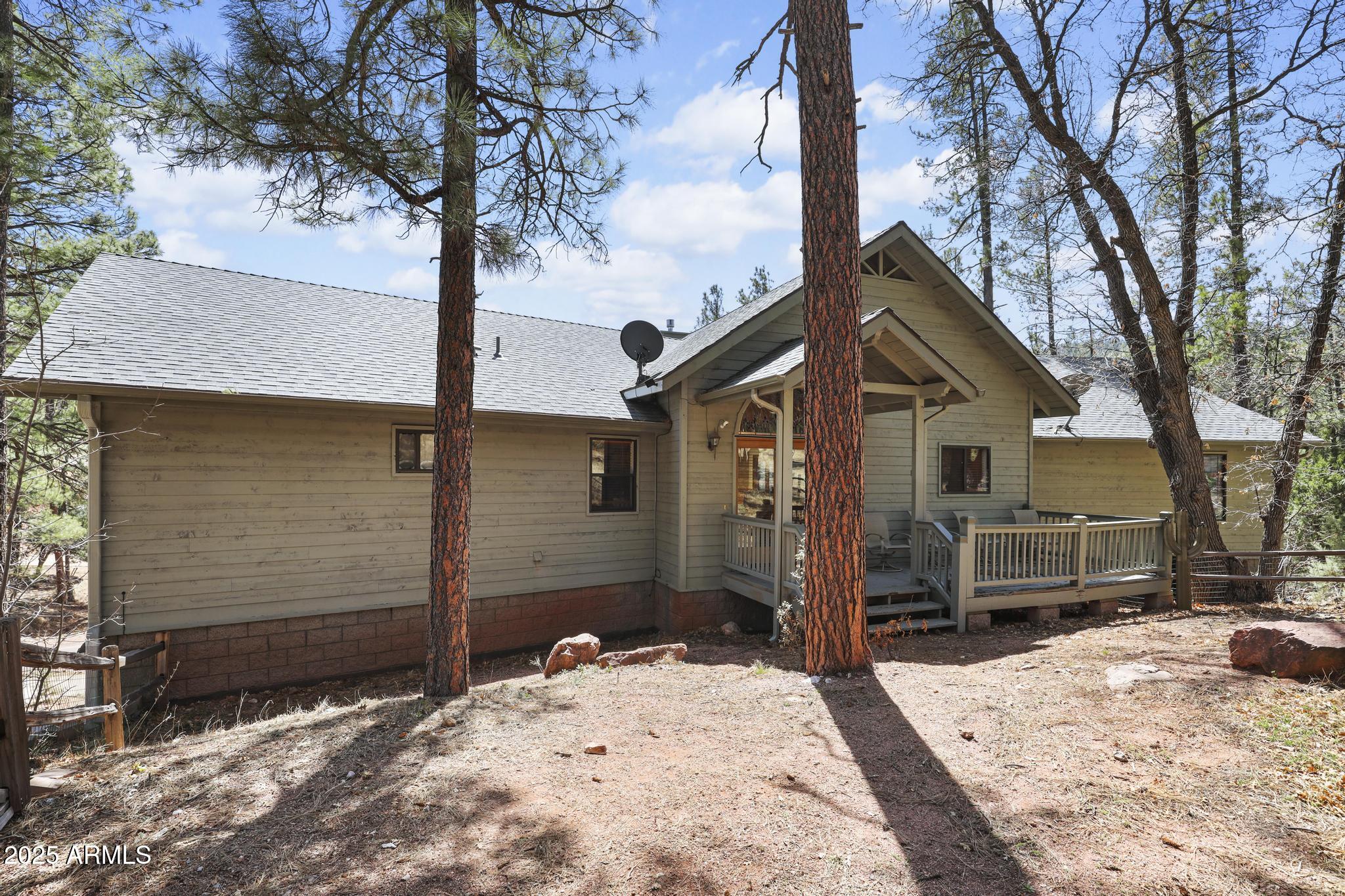 178 Memory Lane Payson, AZ 85541 - Photo 49 of 58 a backyard of a house with large tree