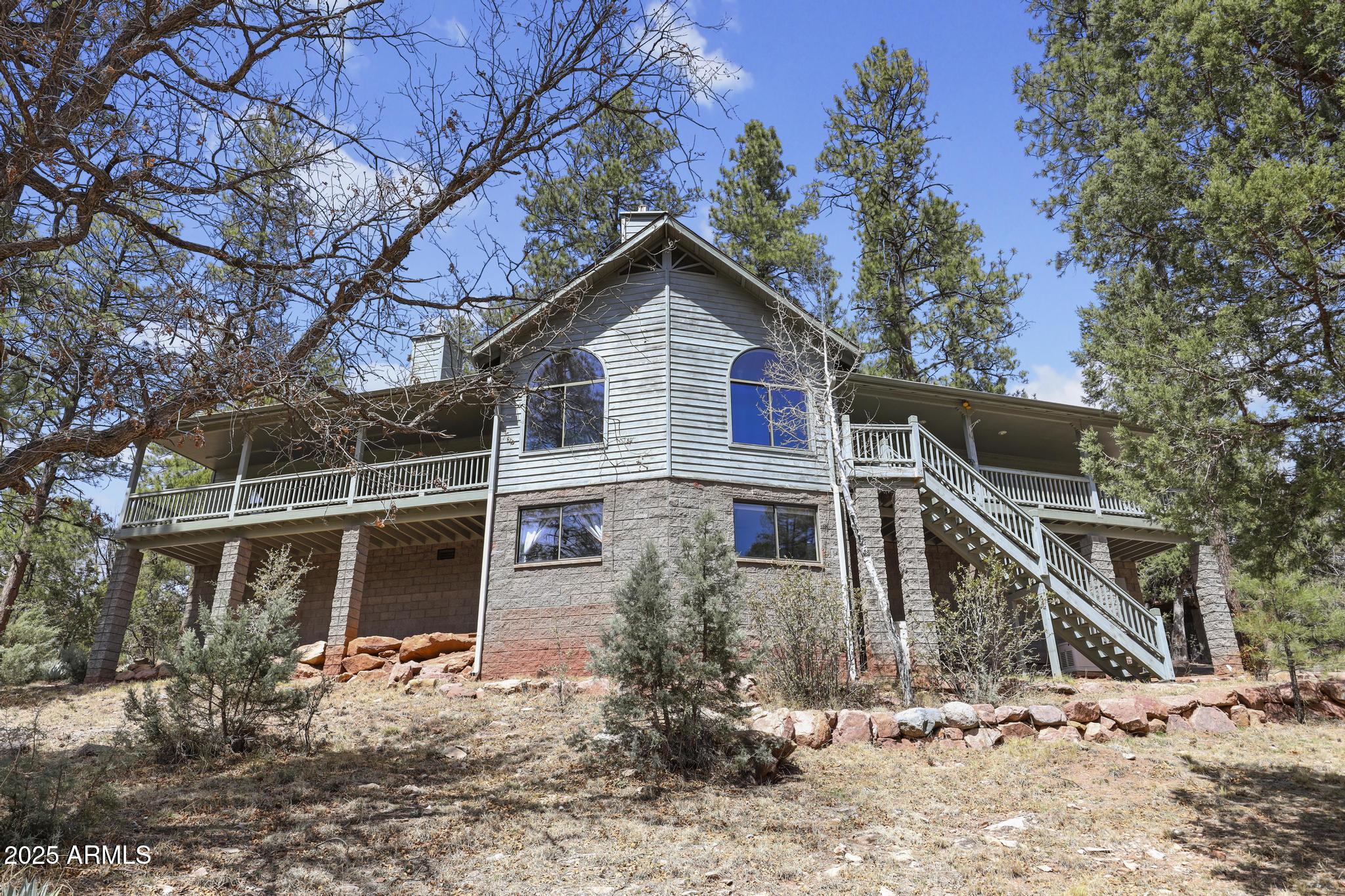 178 Memory Lane Payson, AZ 85541 - Photo 51 of 58 a view of a house with a yard