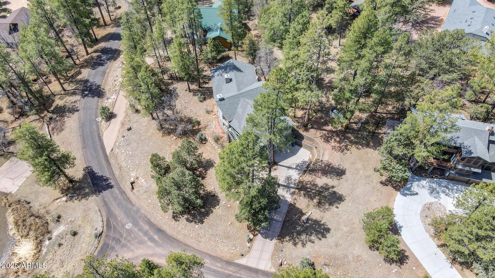 178 Memory Lane Payson, AZ 85541 - Photo 54 of 58 an aerial view of a house with a yard