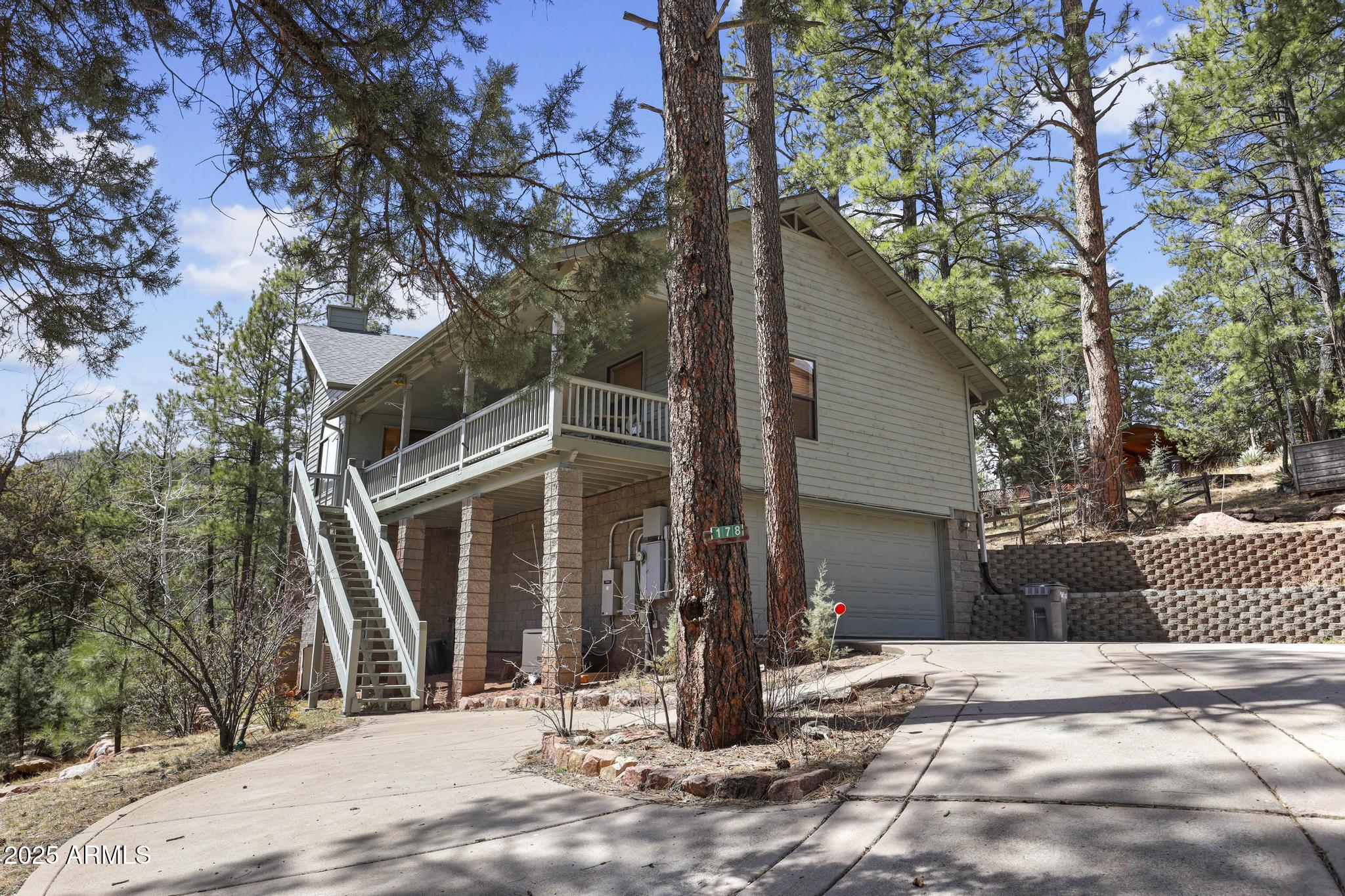 178 Memory Lane Payson, AZ 85541 - Photo 10 of 58 a front view of a house with a yard