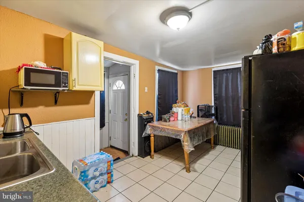 a room with furniture and a flat screen tv