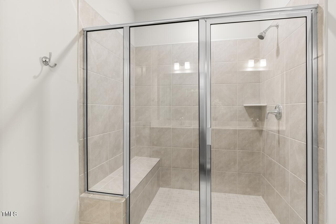 11549 Helmond Way, Unit 114 Raleigh, NC 27617 - Photo 26 of 40 Large Shower with Bench