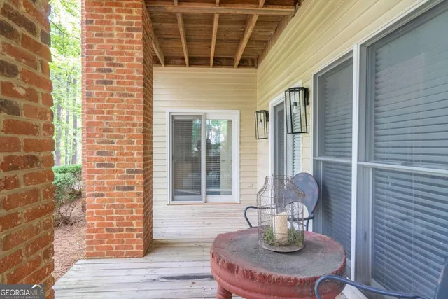 a dining room with table and chairs