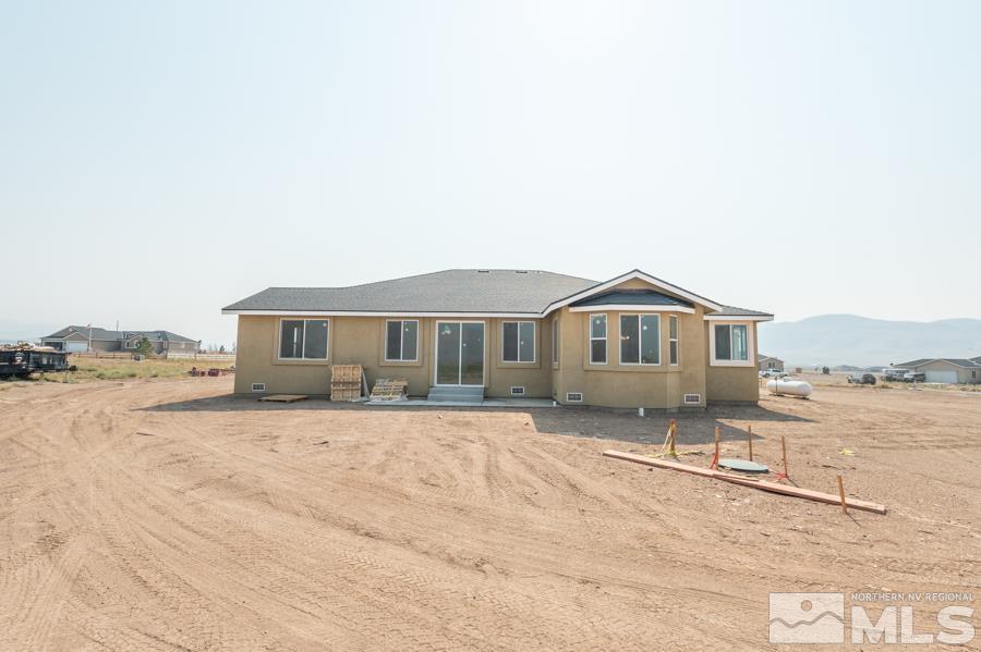 155 James Ranch Court Reno, NV 89510 - Photo 27 of 38 a front view of a house with a yard