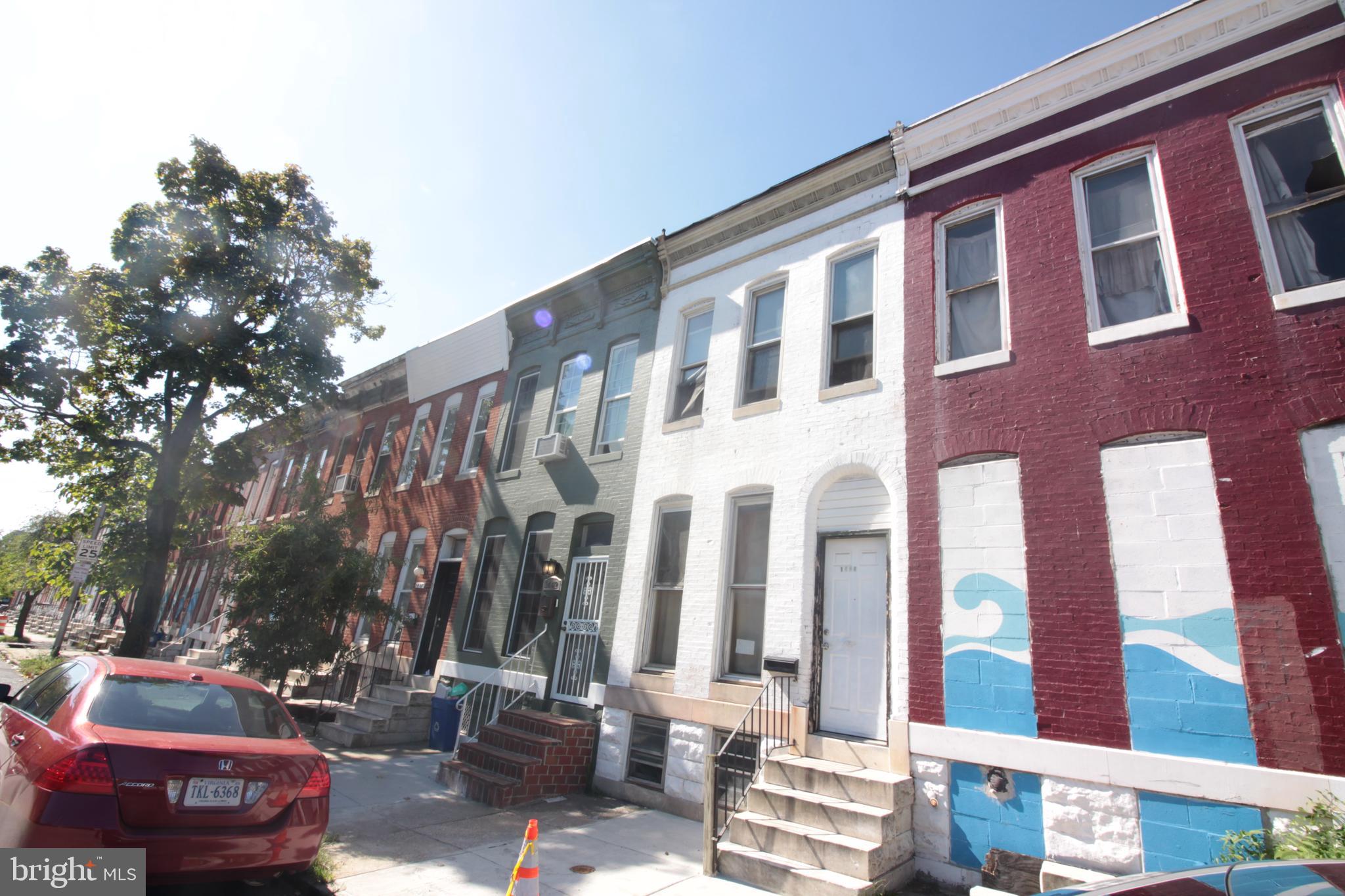1444 Aisquith Street Baltimore, MD 21202 - Photo 1 of 1 a front view of a building with street view