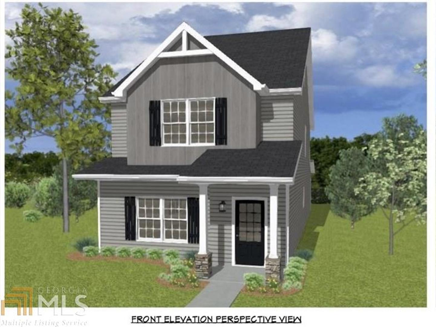 11547 Hastings Bridge Road, Unit 24 Hampton, GA 30228 - Photo 1 of 1 a front view of a house with a yard