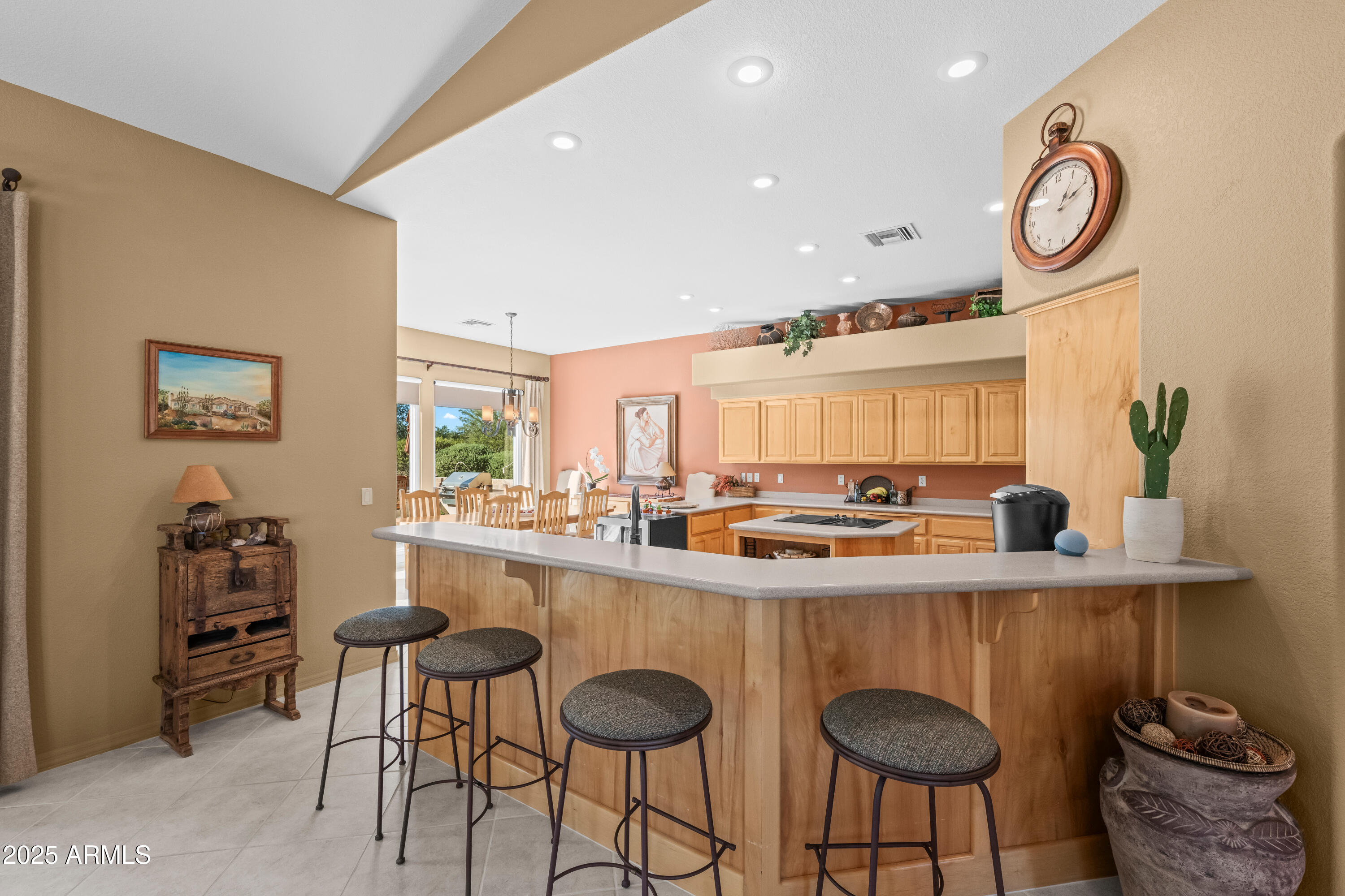 27408 North Agua Verde Drive Rio Verde, AZ 85263 - Photo 15 of 40 a kitchen with stainless steel appliances granite countertop a sink and a refrigerator