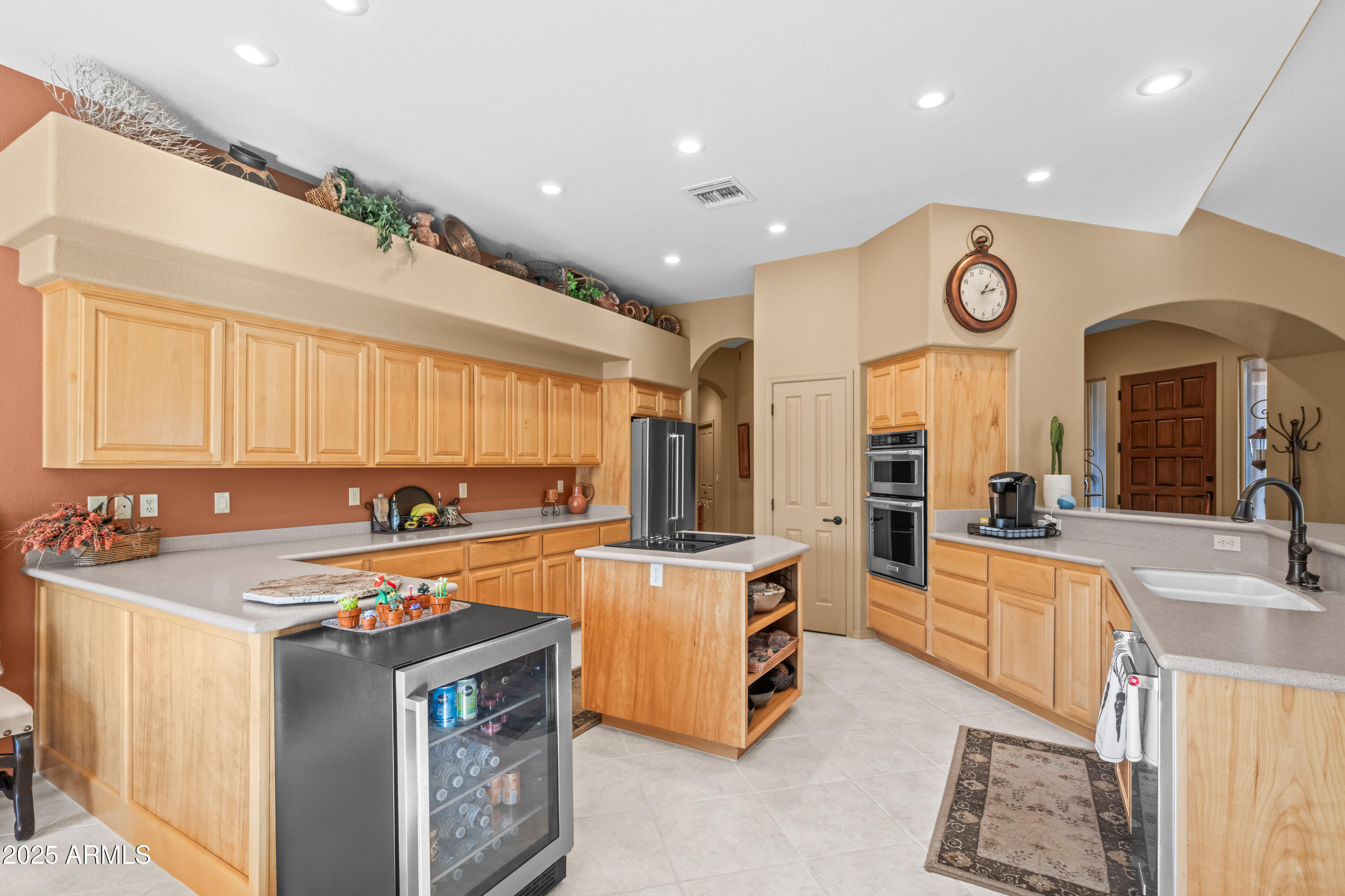 27408 North Agua Verde Drive Rio Verde, AZ 85263 - Photo 16 of 40 a kitchen with a stove a refrigerator and a sink