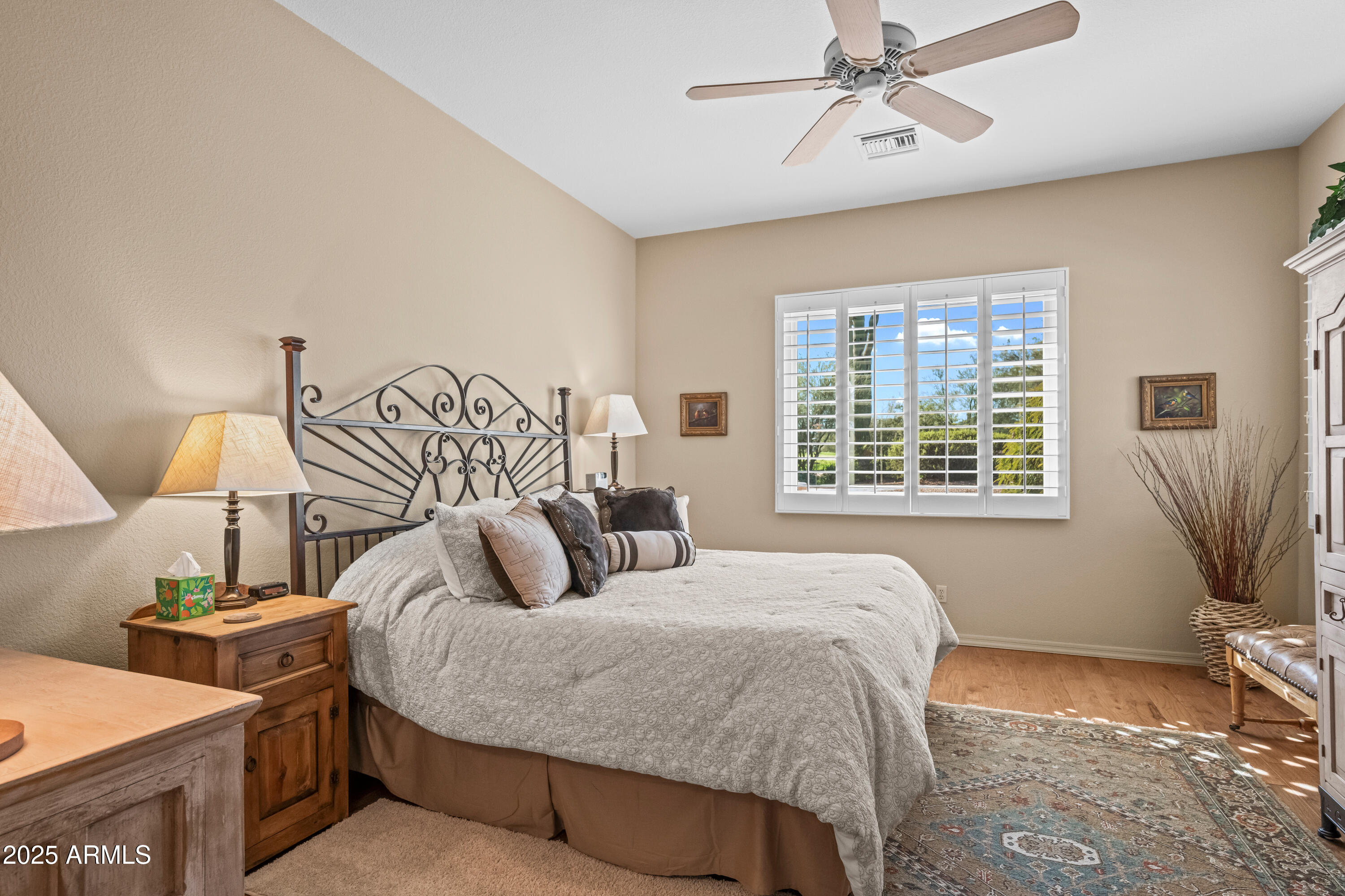 27408 North Agua Verde Drive Rio Verde, AZ 85263 - Photo 21 of 40 a bedroom with a bed and window
