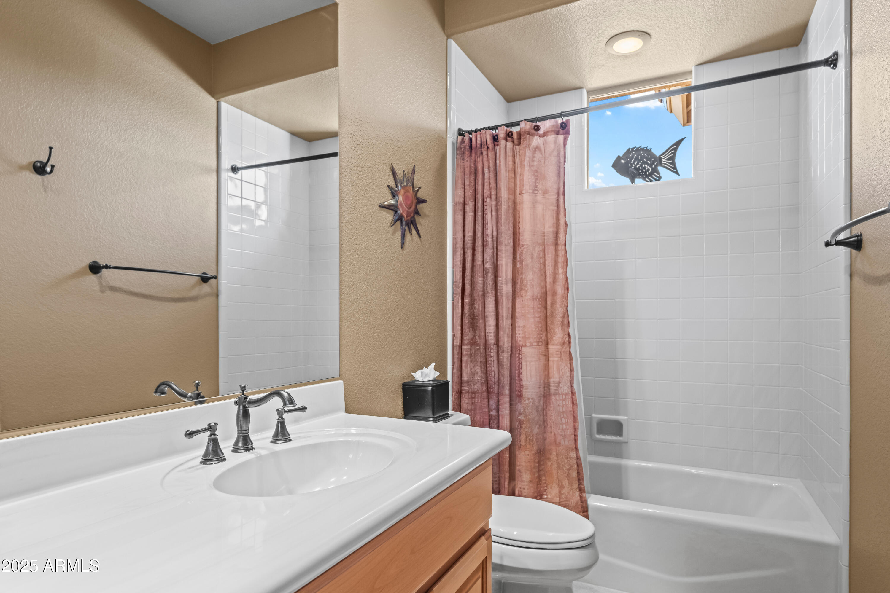 27408 North Agua Verde Drive Rio Verde, AZ 85263 - Photo 27 of 40 a bathroom with a sink toilet and shower
