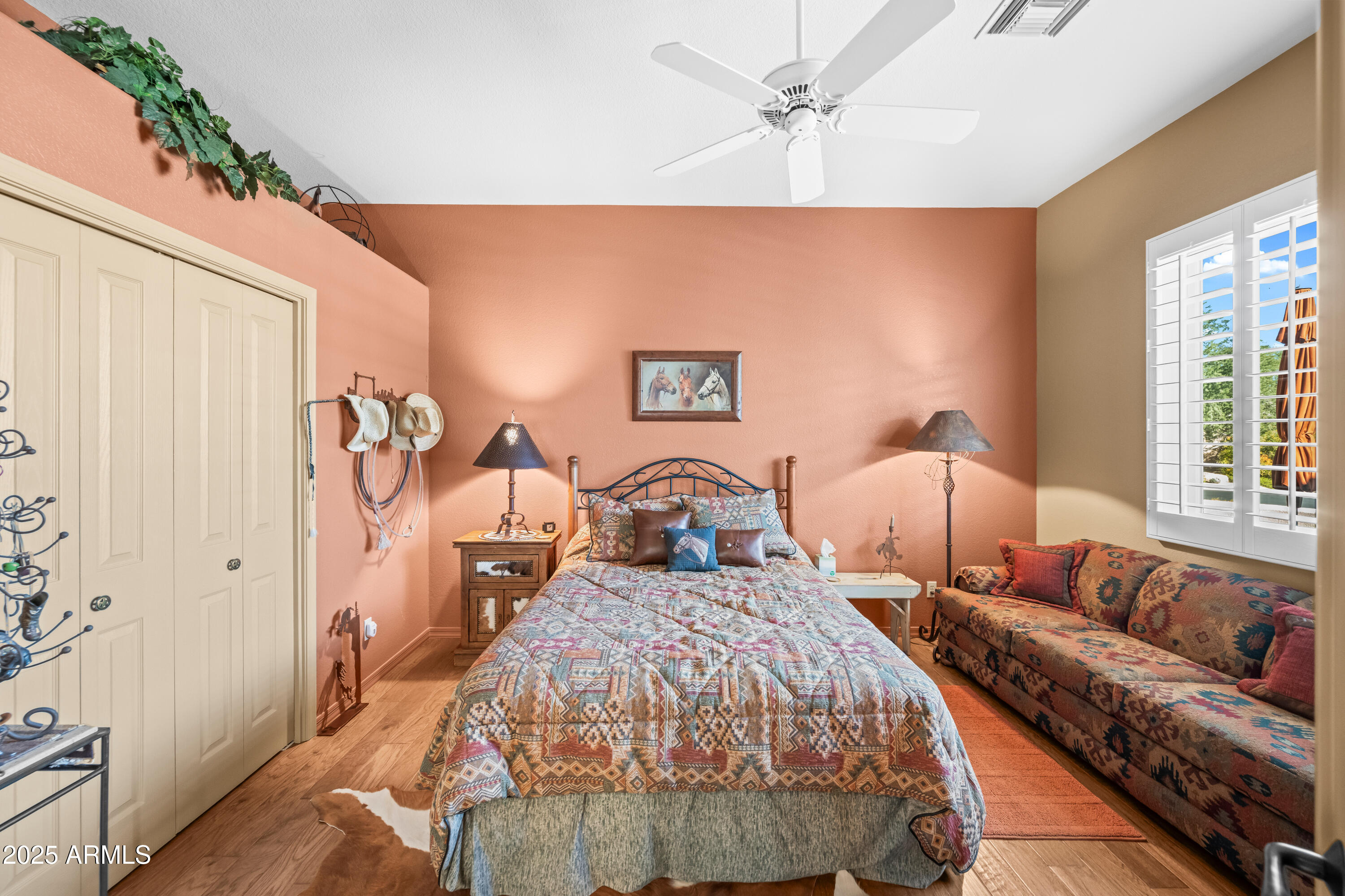 27408 North Agua Verde Drive Rio Verde, AZ 85263 - Photo 29 of 40 a bed room with a bed and a couch