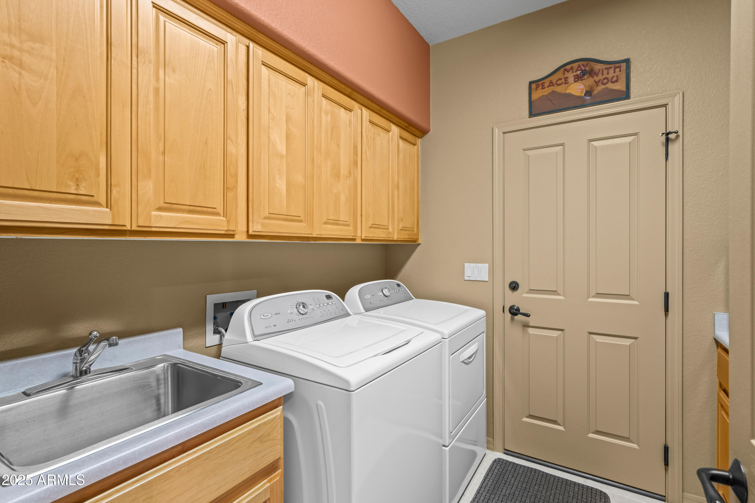 27408 North Agua Verde Drive Rio Verde, AZ 85263 - Photo 31 of 40 a utility room with dryer and washer