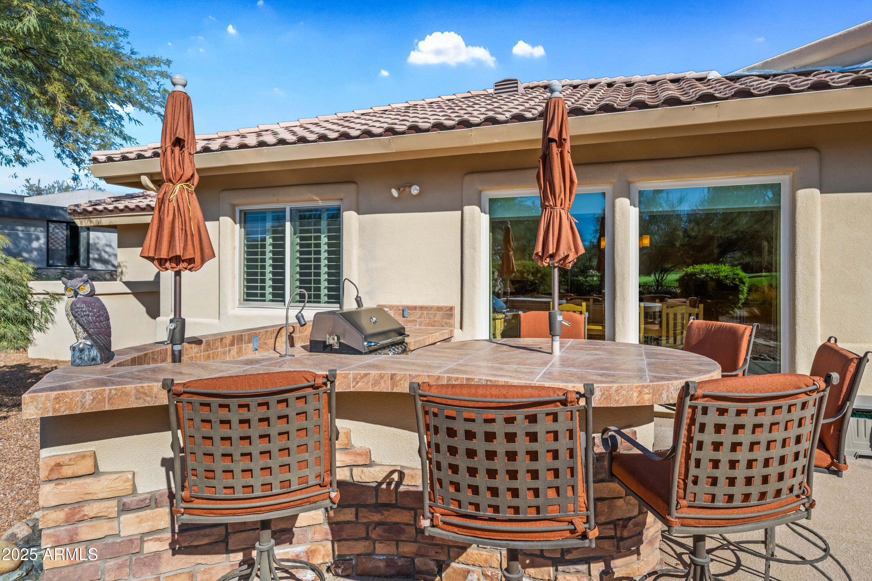 27408 North Agua Verde Drive Rio Verde, AZ 85263 - Photo 32 of 40 a view of a chairs and table in the patio