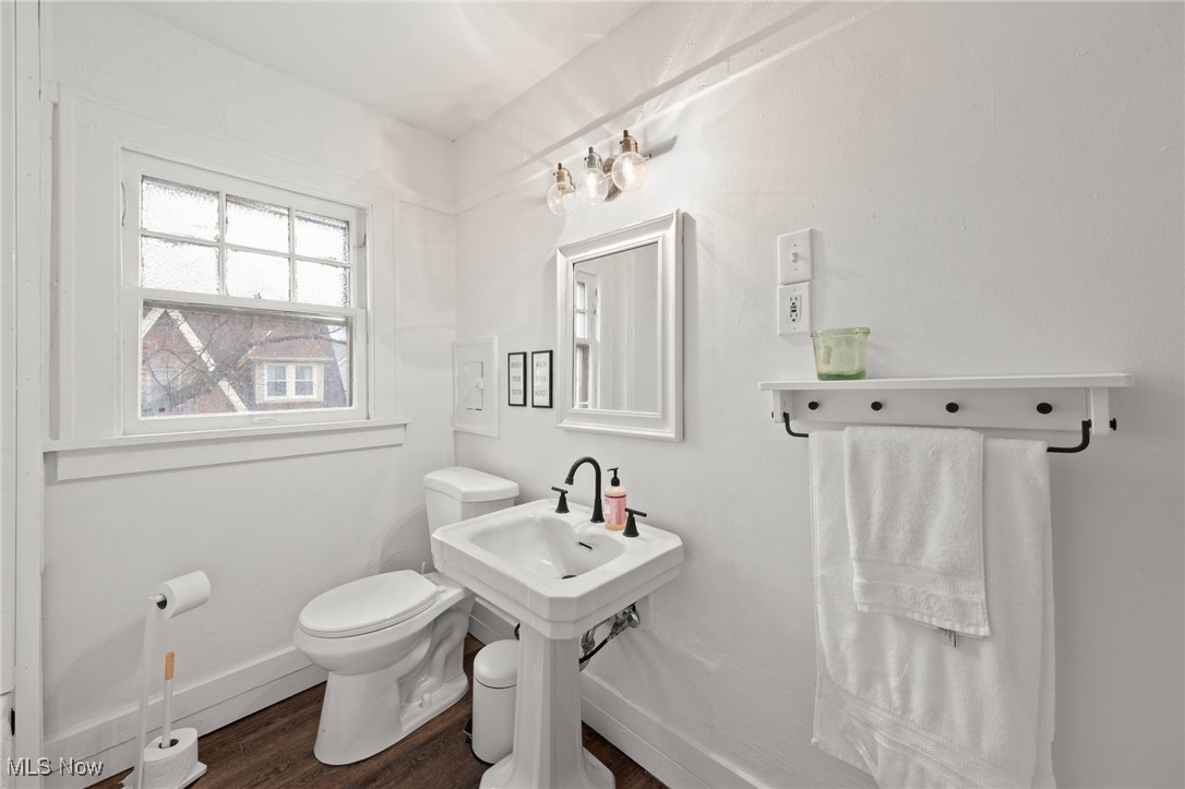 1857 Willowhurst Road Cleveland, OH 44112 - Photo 19 of 26 Bathroom featuring hardwood / wood-style flooring and toilet
