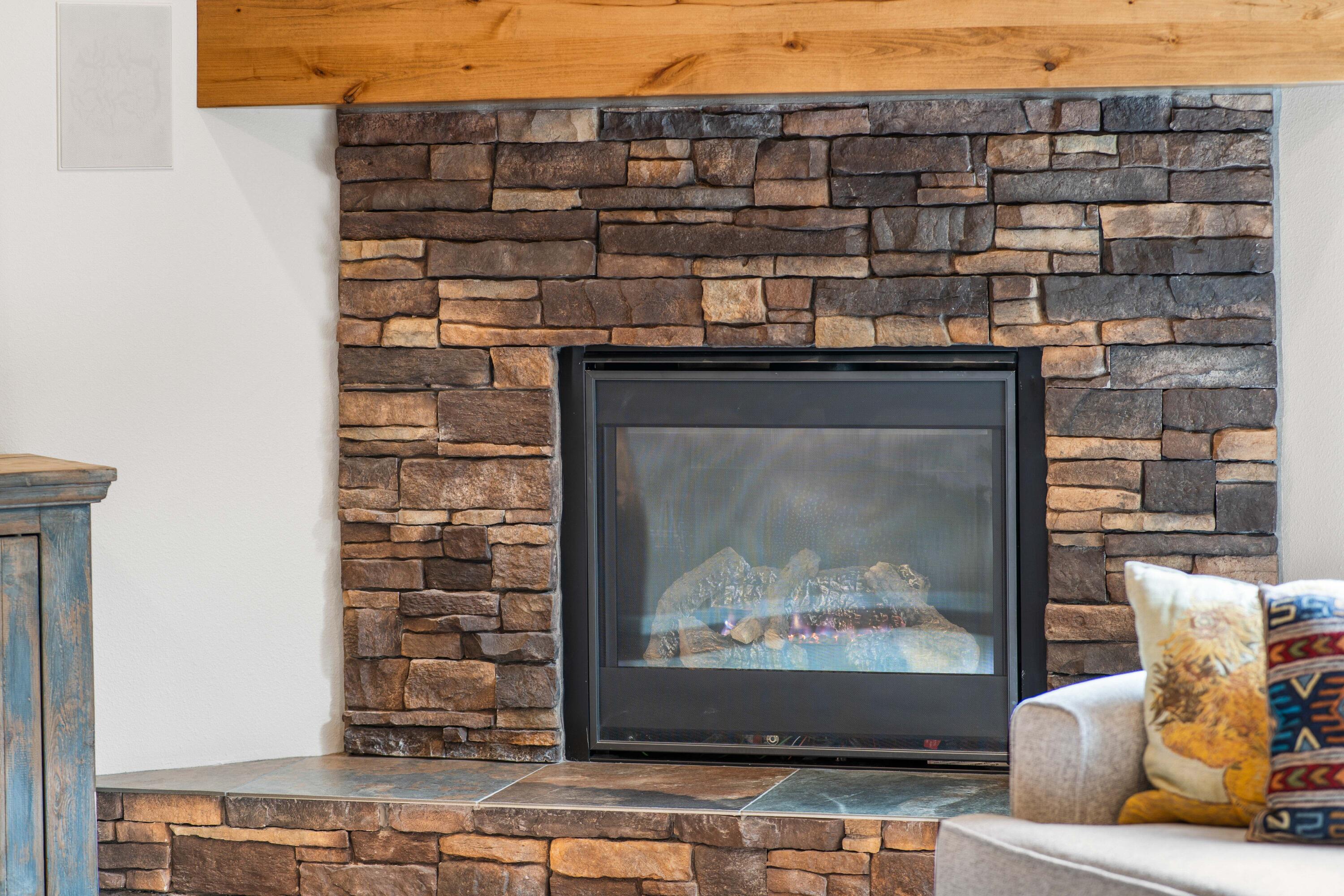 205 Vista Rim Drive Redmond, OR 97756 - Photo 5 of 85 a closeup of a fireplace