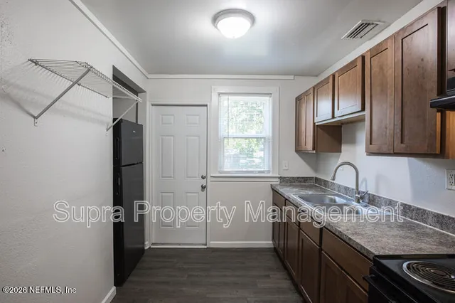 a view of livingroom with hardwood floor and window