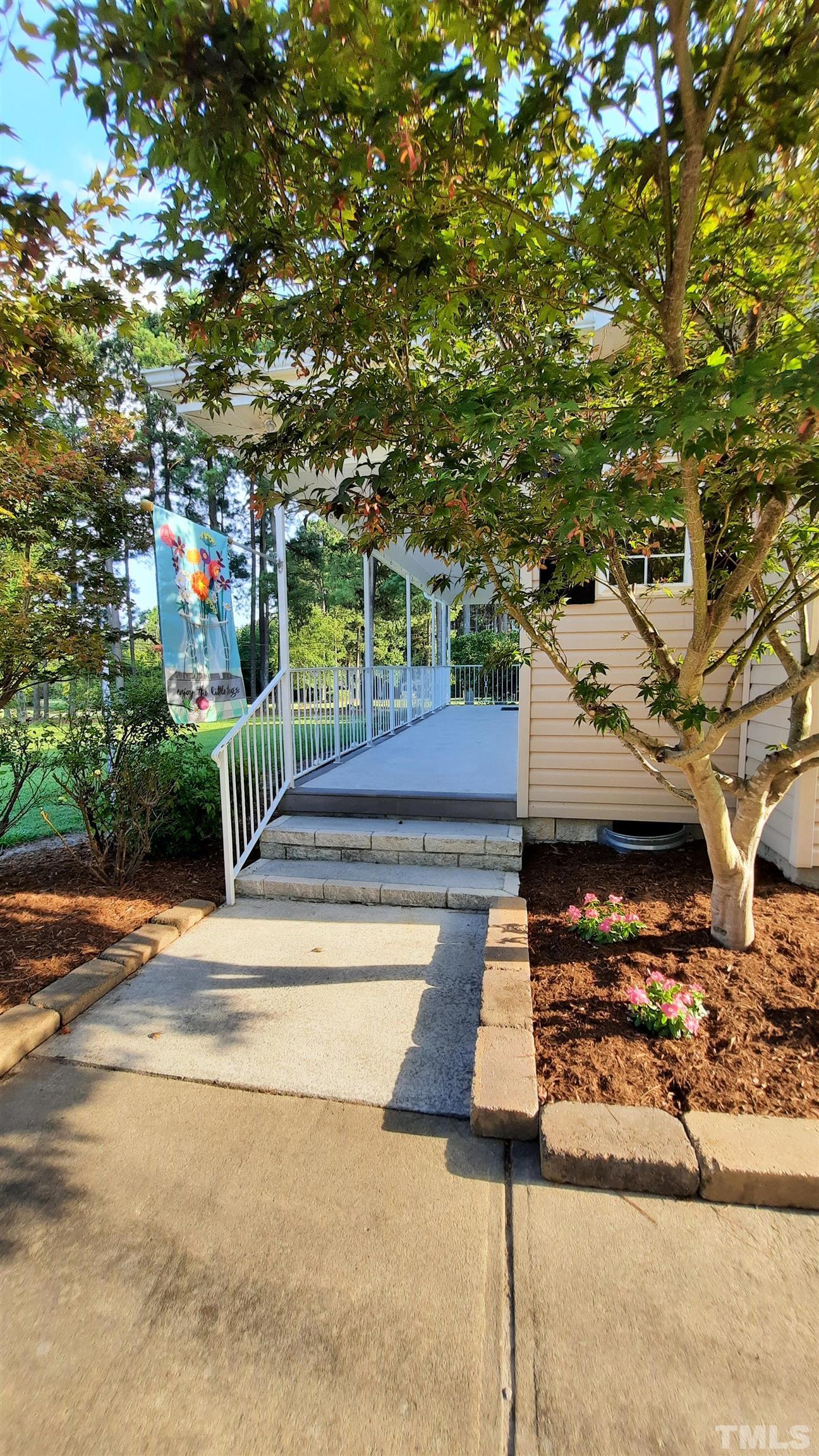 1909 Shaw Road Durham, NC 27704 - Photo 3 of 18 a view of yard along with trees