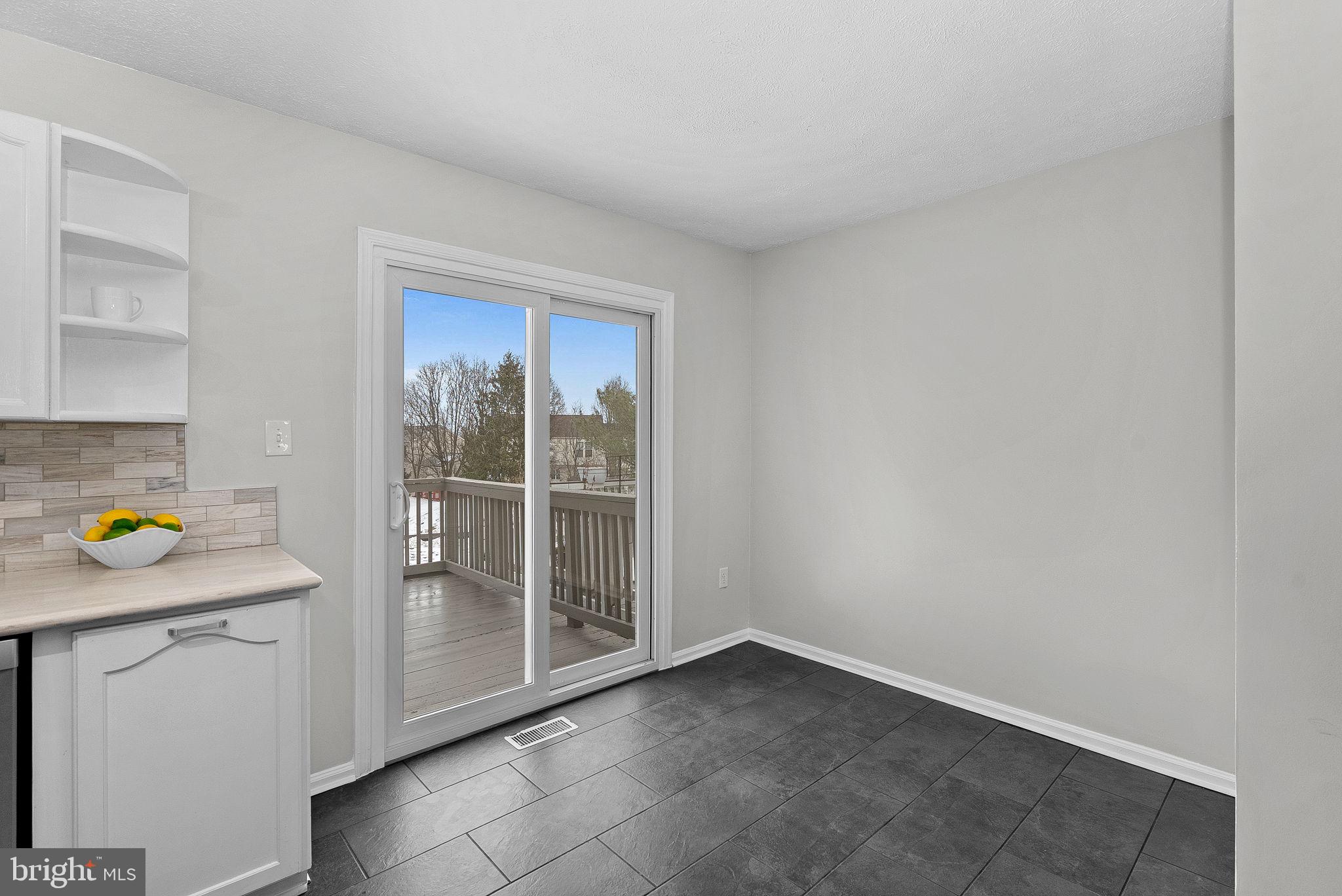 20718 Apollo Terrace Ashburn, VA 20147 - Photo 14 of 44 New Sliding Door Leads to Back Deck