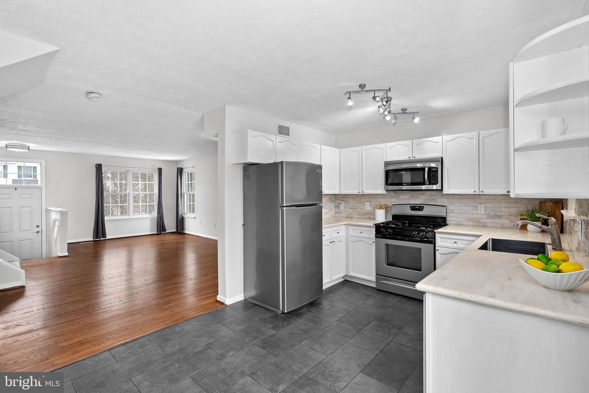 20718 Apollo Terrace Ashburn, VA 20147 - Photo 40 of 44 Open Floor Plan to Updated Kitchen
