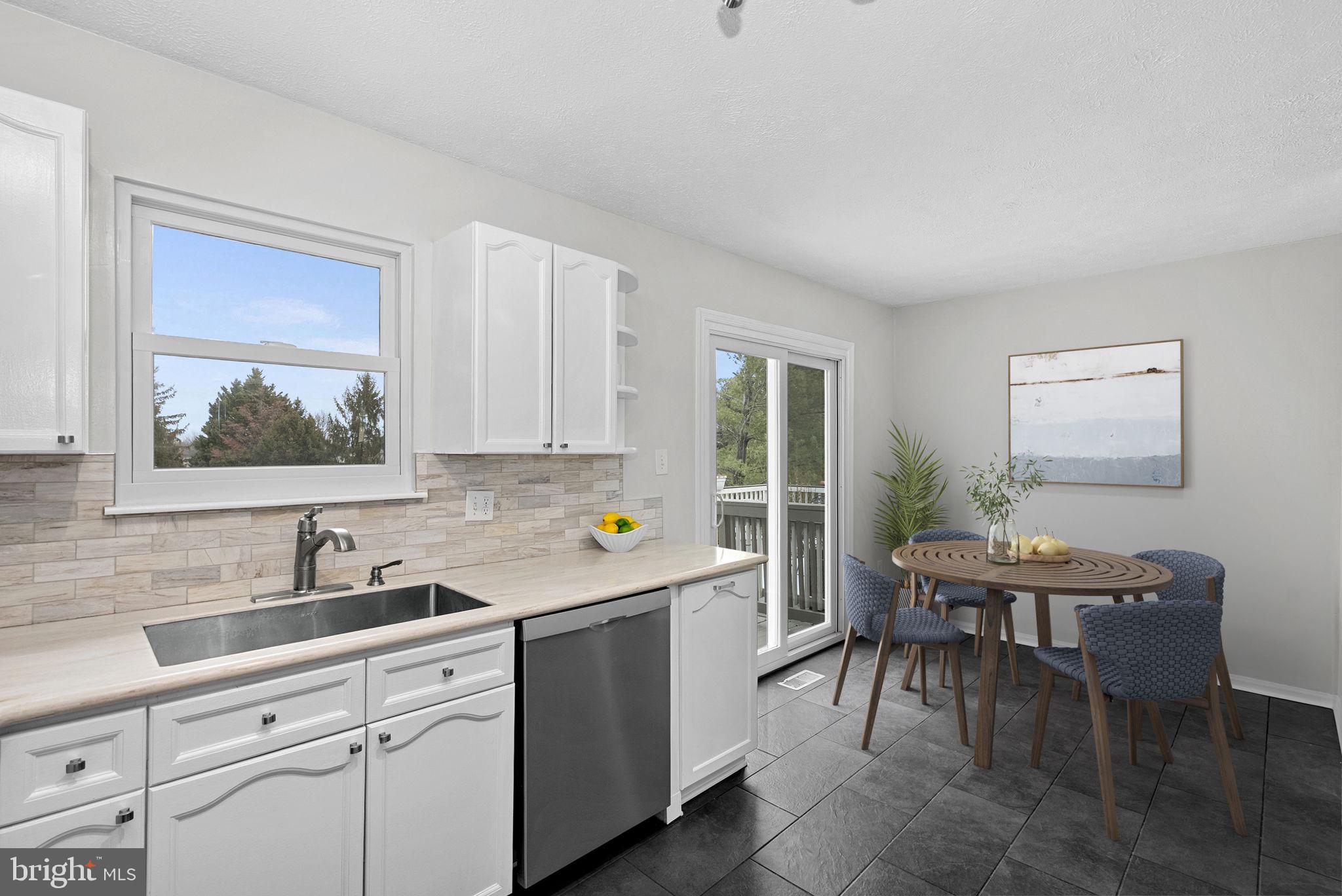20718 Apollo Terrace Ashburn, VA 20147 - Photo 9 of 44 Eat in Kitchen Space (Staged)