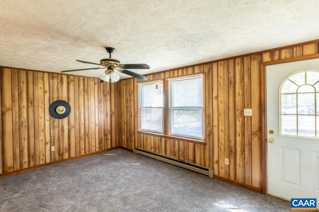 327 Village Road Shipman, VA 22971 - Photo 13 of 48 a view of an empty room with a window