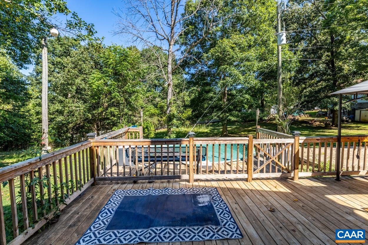 327 Village Road Shipman, VA 22971 - Photo 2 of 48 a view of a balcony with wooden floor