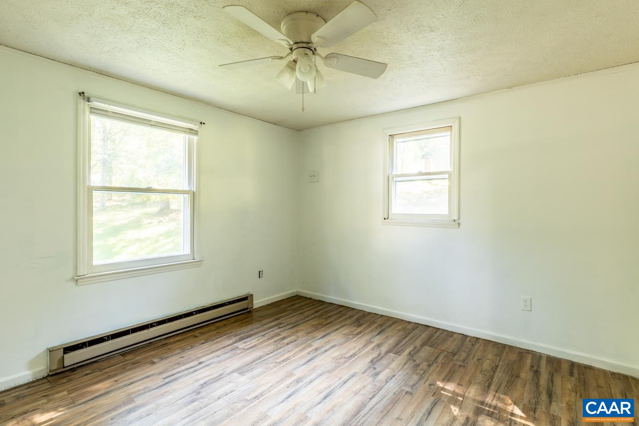 327 Village Road Shipman, VA 22971 - Photo 23 of 48 an empty room with a window