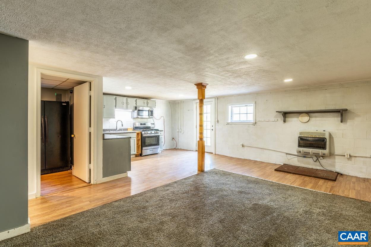 327 Village Road Shipman, VA 22971 - Photo 28 of 48 a view of a living room kitchen and a sink