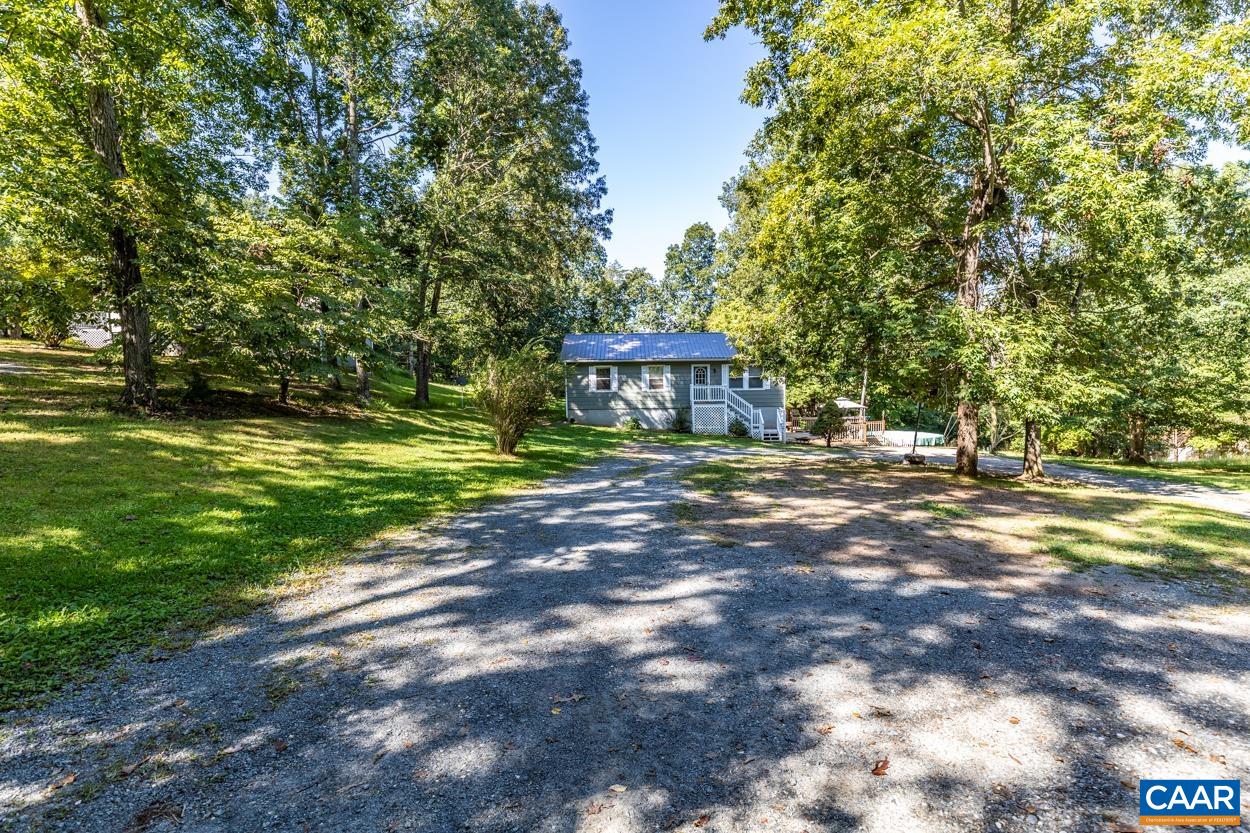 327 Village Road Shipman, VA 22971 - Photo 4 of 48 a view of a house with a yard