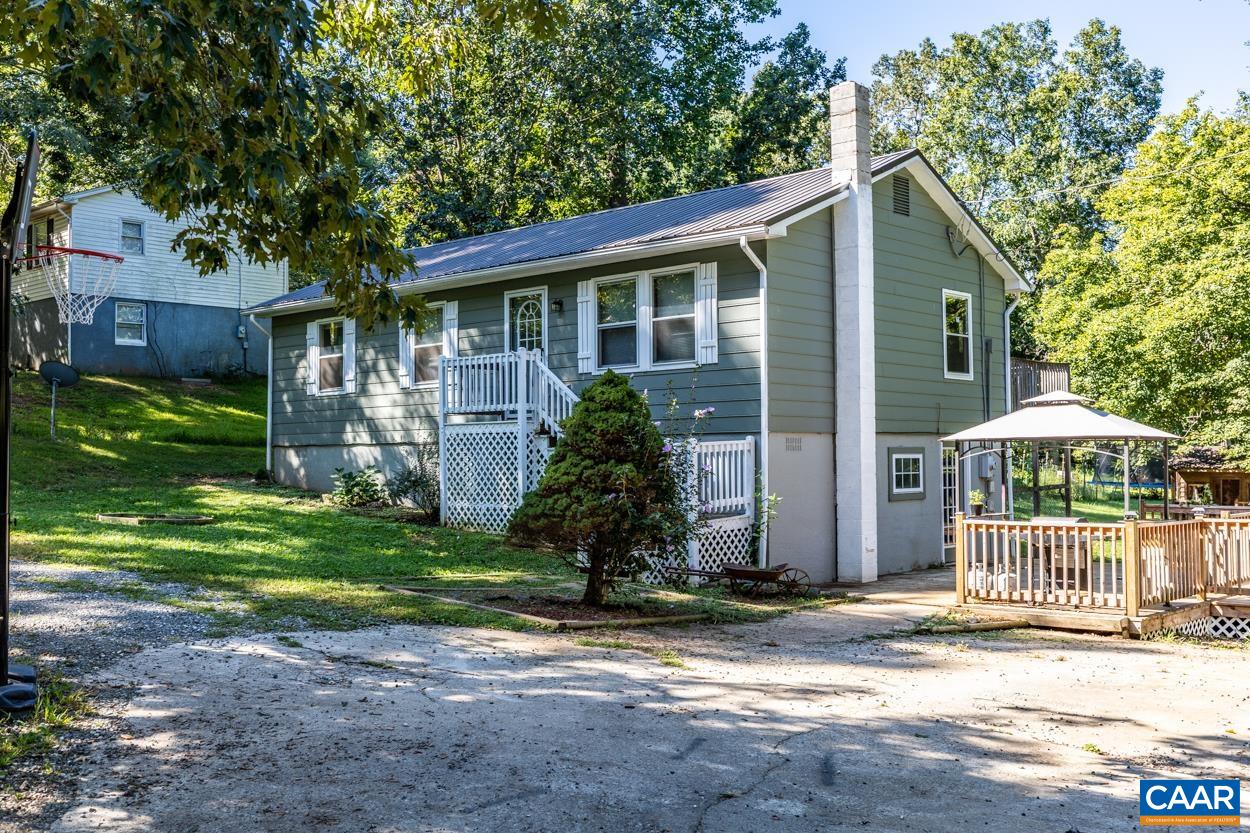 327 Village Road Shipman, VA 22971 - Photo 48 of 48 a front view of a house with garden