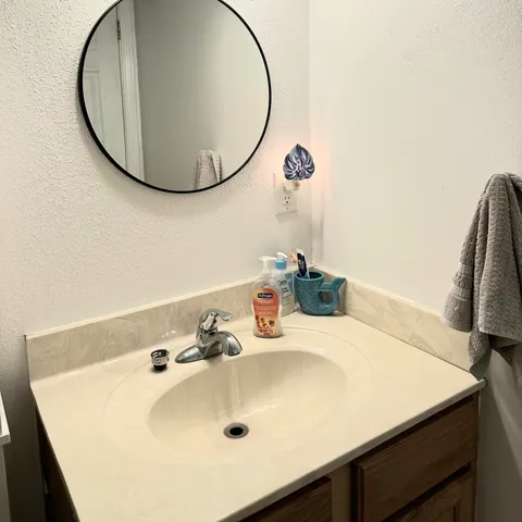 a bathroom with a toilet and a sink