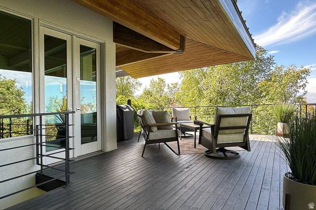 11454 South Oberland Road Sandy, UT 84092 - Photo 80 of 103 Expansive outdoor deck featuring wood-finish flooring and a partial wood-paneled ceiling