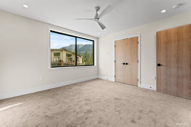 a kitchen with stainless steel appliances granite countertop a stove and a refrigerator