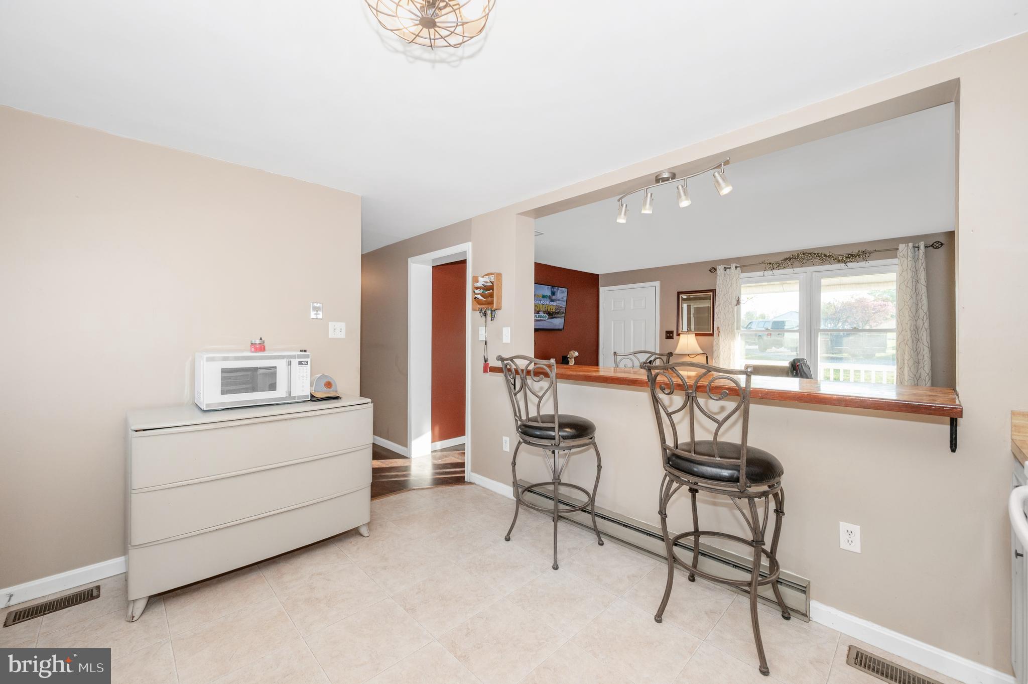 13411 Rabbit Run Terrace Union Bridge, MD 21791 - Photo 11 of 47 a living room with furniture and a window