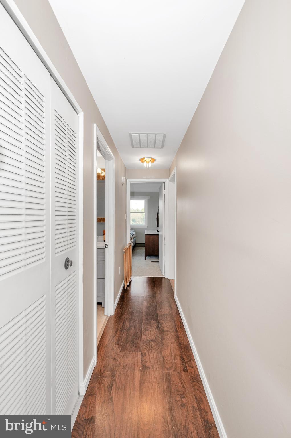 13411 Rabbit Run Terrace Union Bridge, MD 21791 - Photo 14 of 47 a view of a hallway with wooden floor