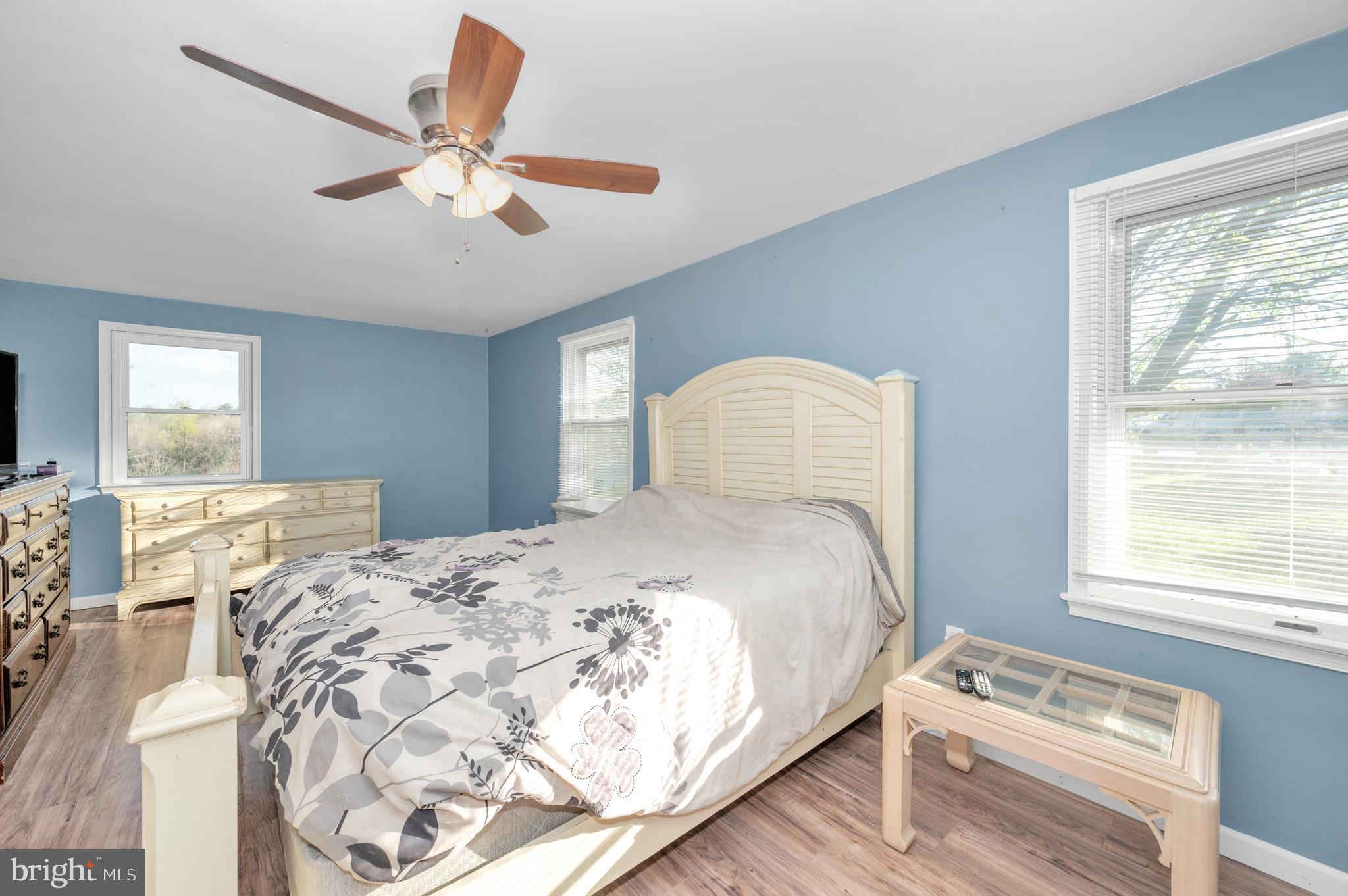 13411 Rabbit Run Terrace Union Bridge, MD 21791 - Photo 15 of 47 a bedroom with a large bed and a window