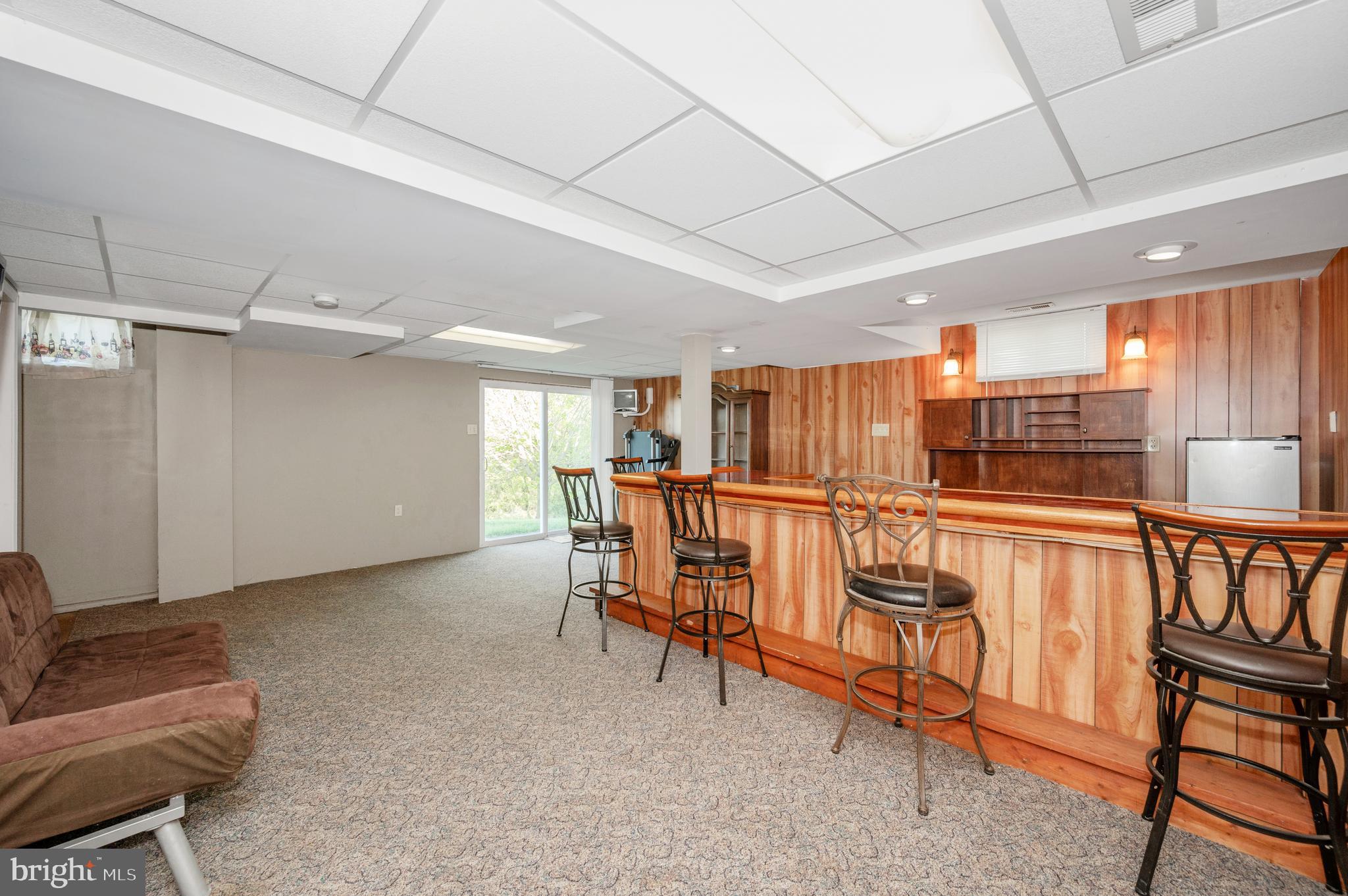 13411 Rabbit Run Terrace Union Bridge, MD 21791 - Photo 29 of 47 a room with lots of chairs and mirrors