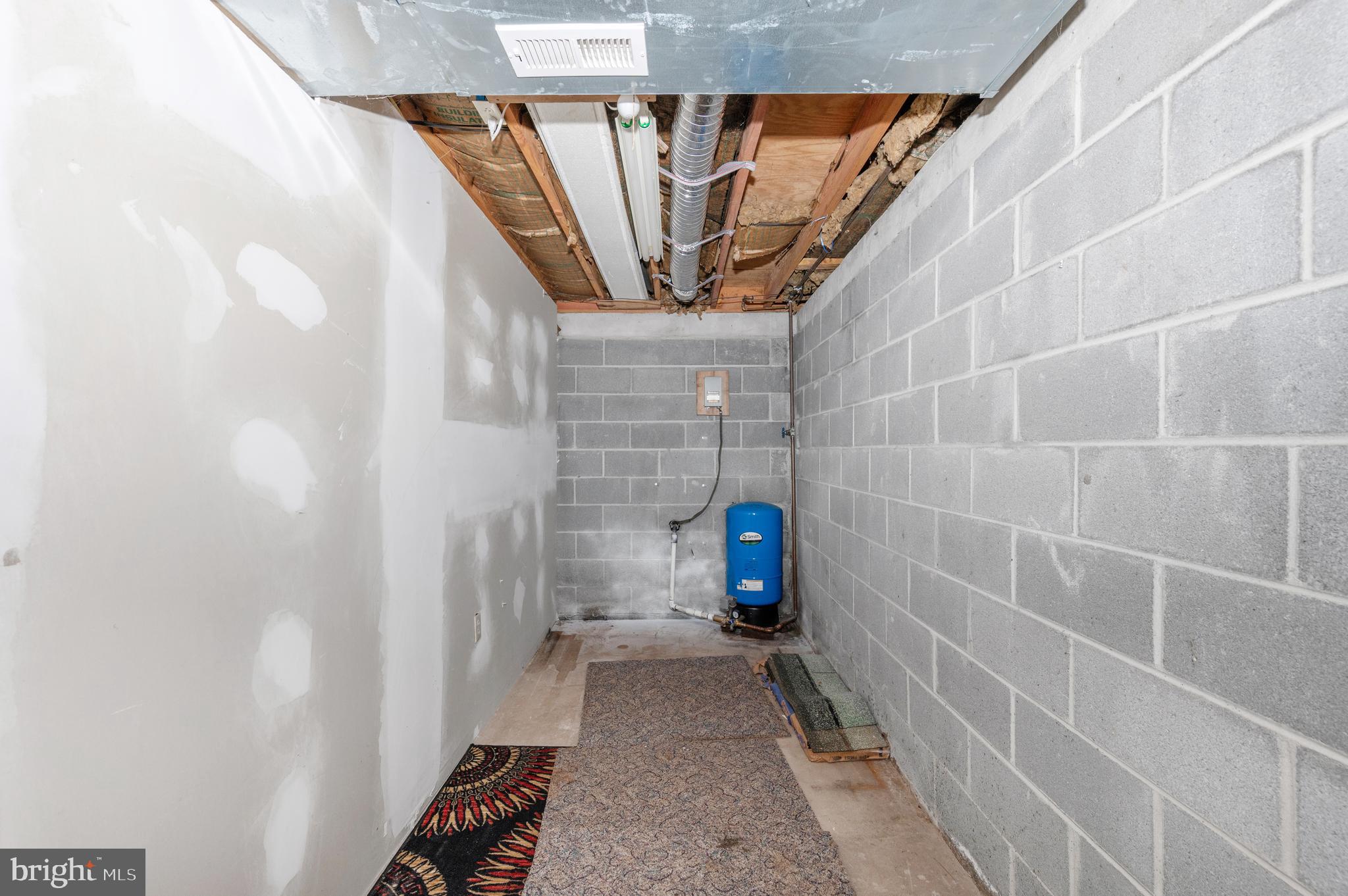 13411 Rabbit Run Terrace Union Bridge, MD 21791 - Photo 32 of 47 a view of water heater room