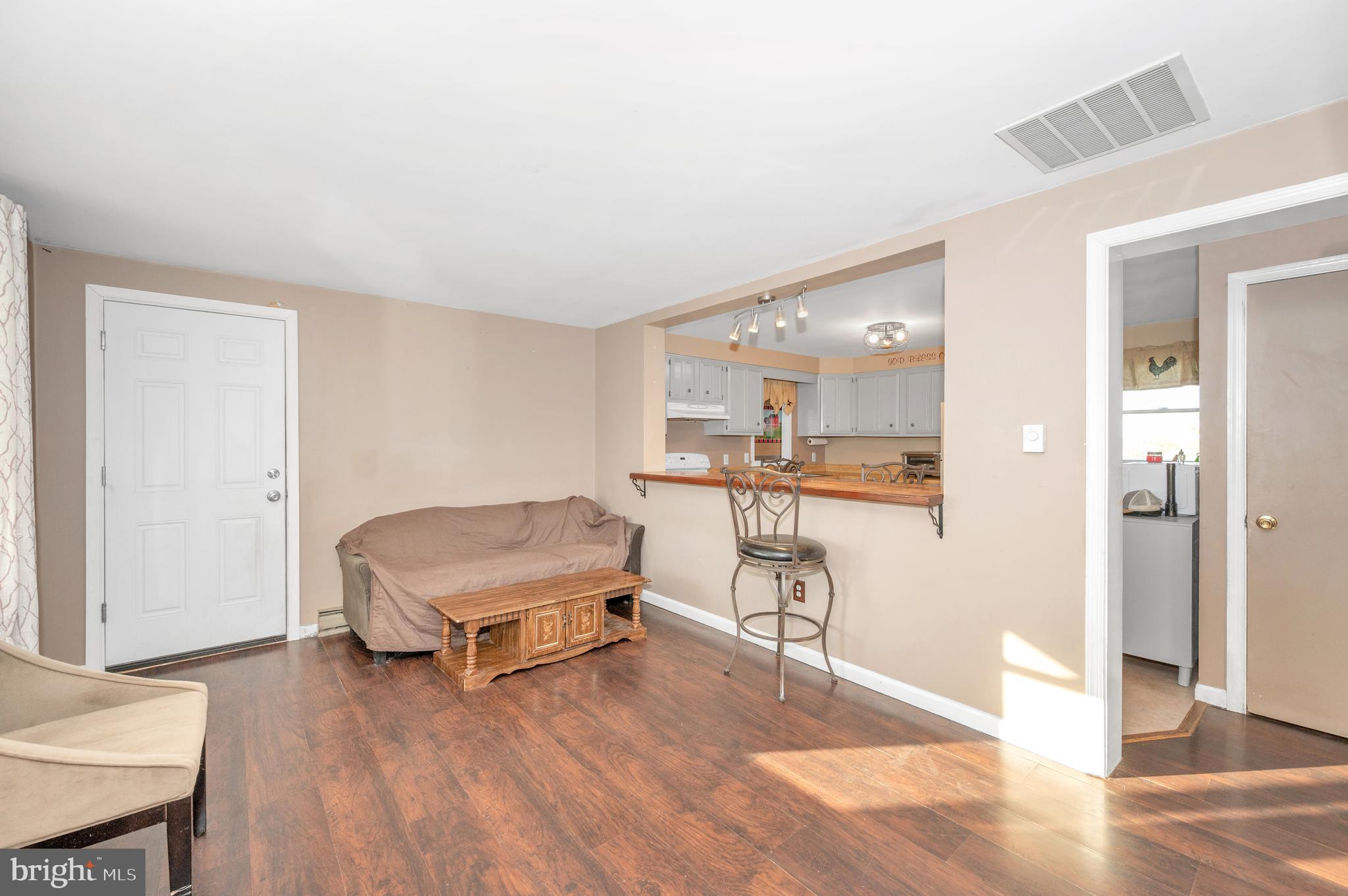 13411 Rabbit Run Terrace Union Bridge, MD 21791 - Photo 4 of 47 a living room with furniture and a table