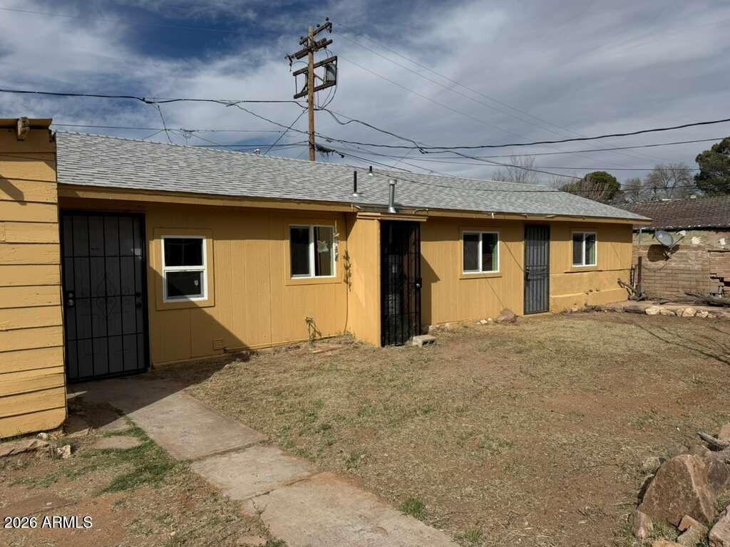 a front view of a house with a garage