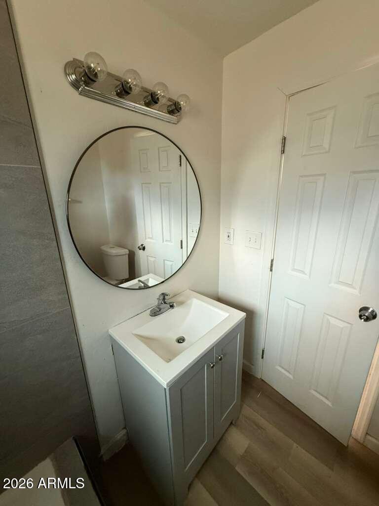 1258 East 15th Street Douglas, AZ 85607 - Photo 11 of 15 a utility room with wooden floor washer and dryer