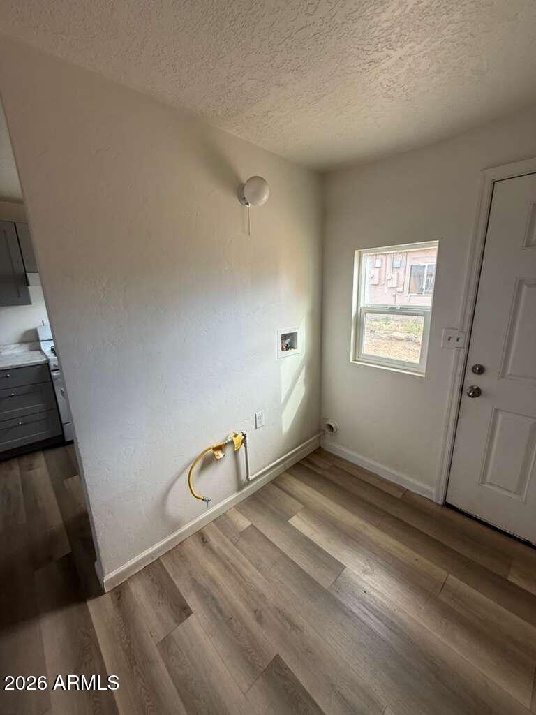 1258 East 15th Street Douglas, AZ 85607 - Photo 2 of 15 a view of an empty room and window