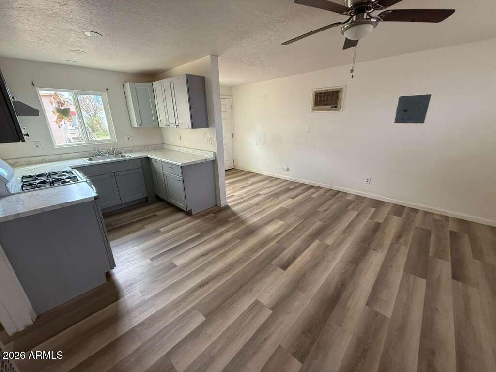 1258 East 15th Street Douglas, AZ 85607 - Photo 4 of 15 a view of a kitchen with a sink and dishwasher