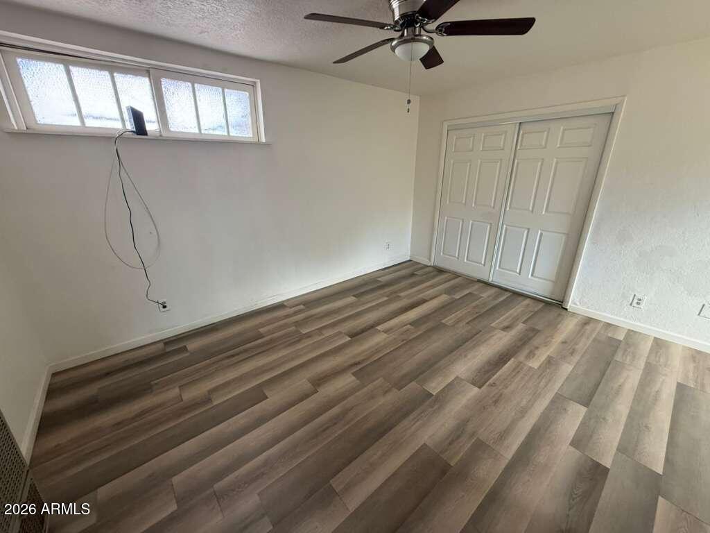 1258 East 15th Street Douglas, AZ 85607 - Photo 7 of 15 a view of an empty room with a window