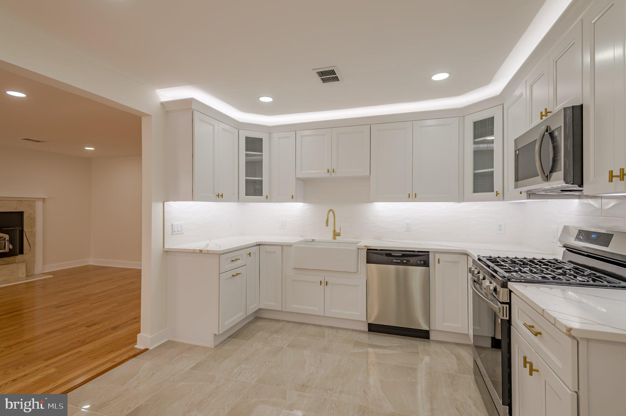 104 Hopewell Road Marlton, NJ 08053 - Photo 13 of 27 a kitchen with stainless steel appliances granite countertop a stove and a sink