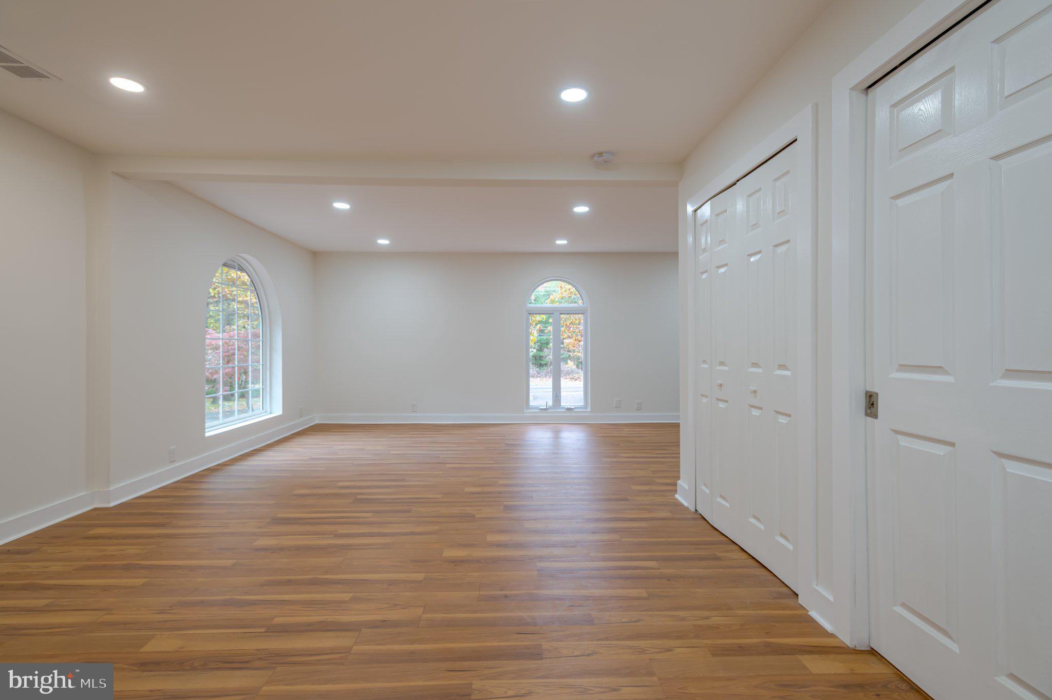 104 Hopewell Road Marlton, NJ 08053 - Photo 16 of 27 a view of empty room with wooden floor and fan